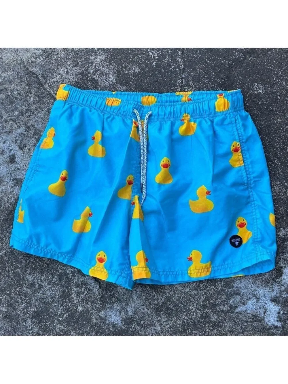 Molokai Surf Co. Rubber Ducks Swim Trunks in Blue - Size Large